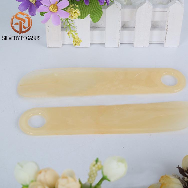 Durable Translucent Plastic Shoehorn - Compact and Practical Design