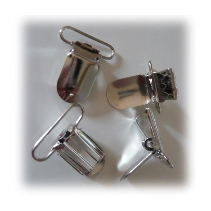 Attaches pour bretelles ou tétines