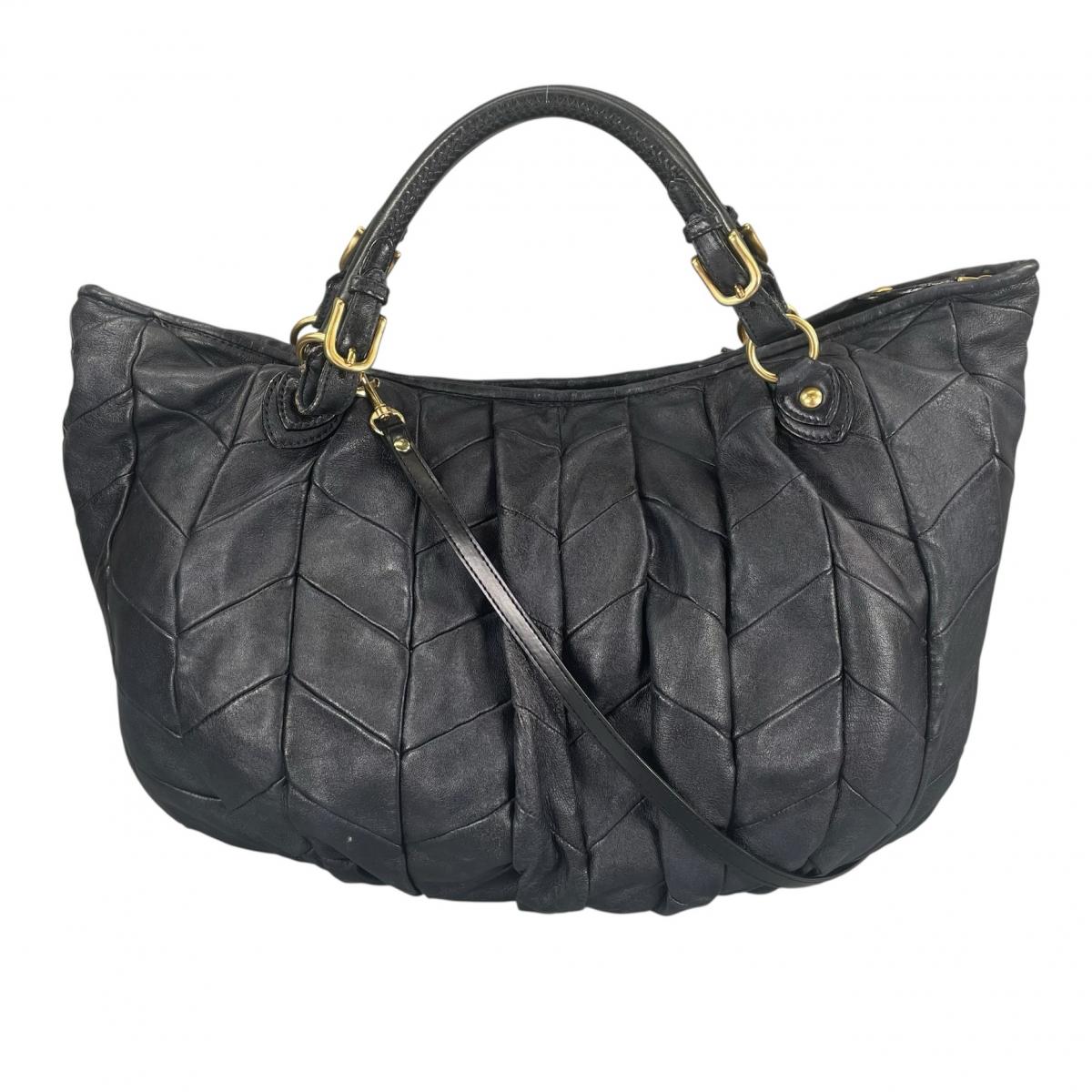

MIUMIU quilting Matelassé Handbag leather black Women Used