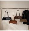Bolsa de Ombro Baguette Feminina Versátil em Camurça Retrô 2025