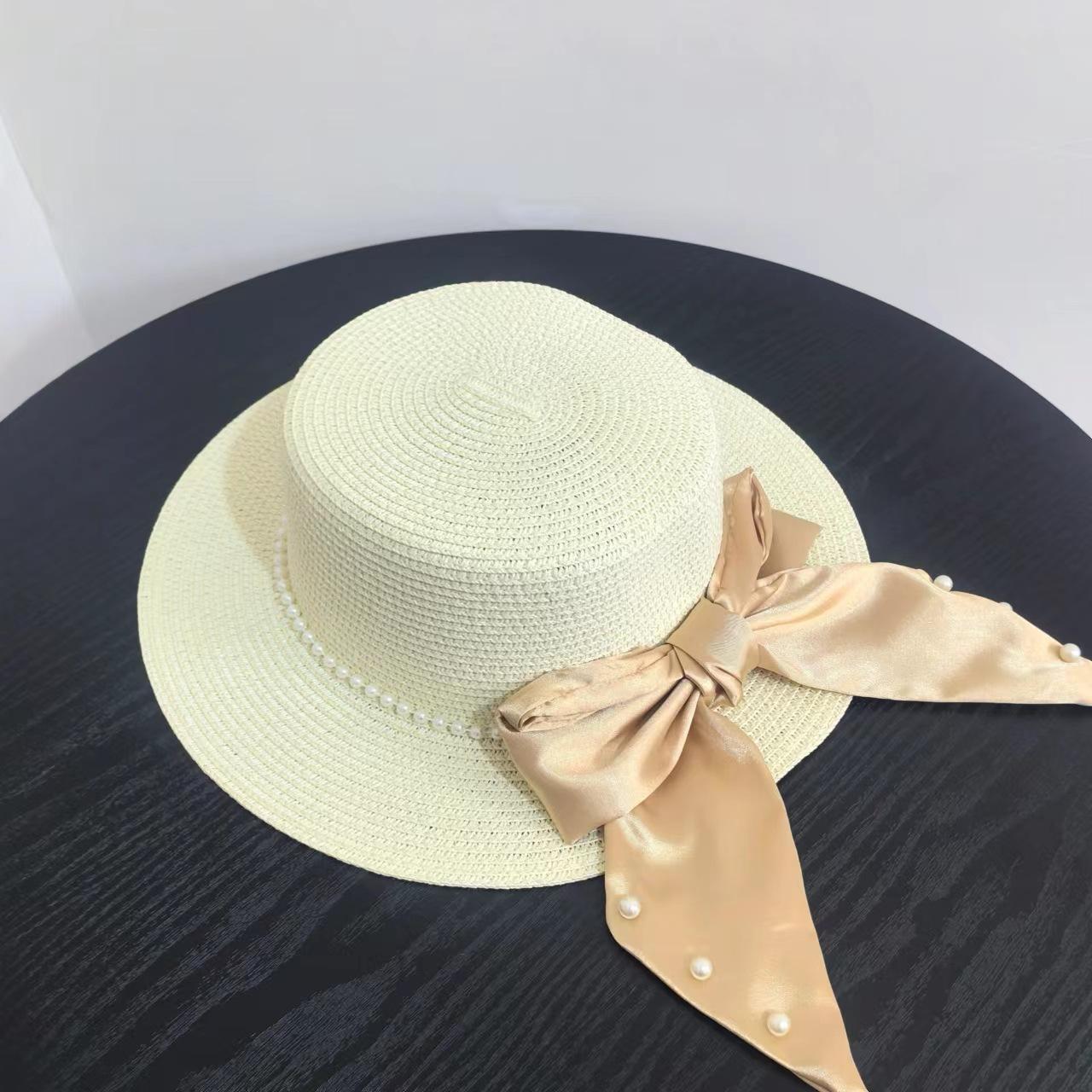 

Summer flat top top top top hat bow pearl seaside vacation sunshade sun protection beach straw hat 2025 straw hat woman