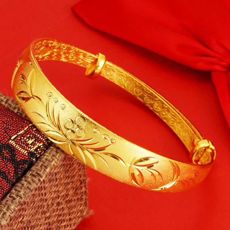 

Елегантний в єтнамський браслет з піщаного золота з драконом та феніксом: Жіноча позолочена 24-каратна монета з квітковим візерунком, регульована мідна застібка-пух.