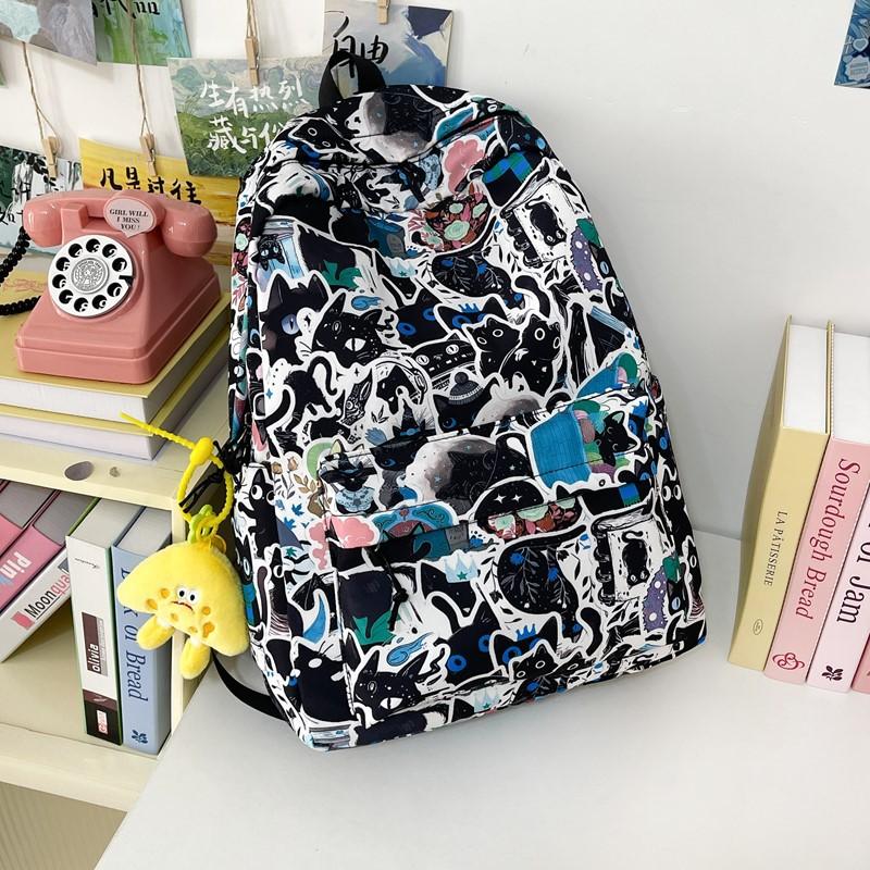 New high-value niche personalized graffiti comics trendy cool backpacks for men and women lightweight large-capacity backpacks
