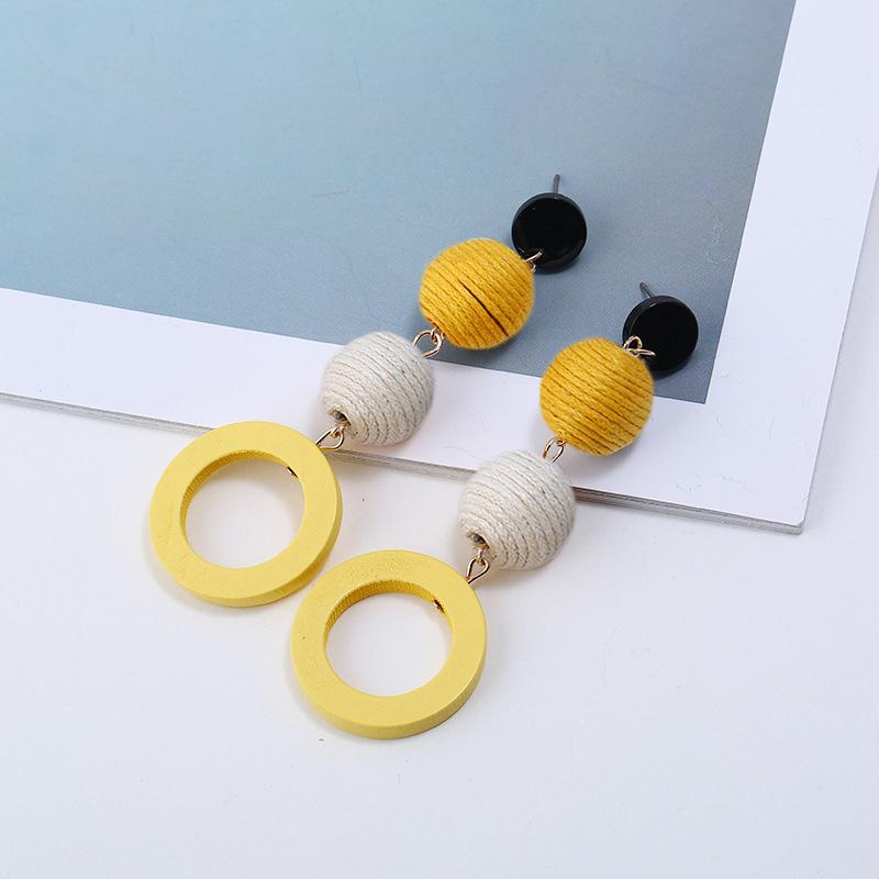 

Льняной шнур Контрастный цвет Три шара Круглые Деревянные Личность Геометрия Подвесные серьги для женщин Корейская модная бижутерия жёлтый
