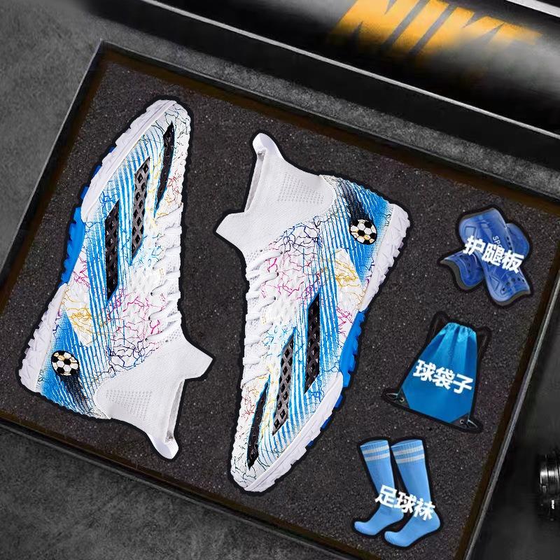 Neue Weltmeisterschaft professionelle Wettkampfschuhe Outdoor-Sport tägliche Trainingsschuhe Herren- und Damenfußballschuhe rutschfest