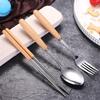 Stainless Steel Cutlery Set with Wooden Handles - Includes Chopsticks, Fork & Spoon for Students and Outdoor Travel.