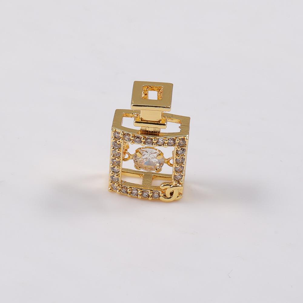 

Crystal Perfume Bottle Pendant with Diamond Border Hollow Design Jewelry