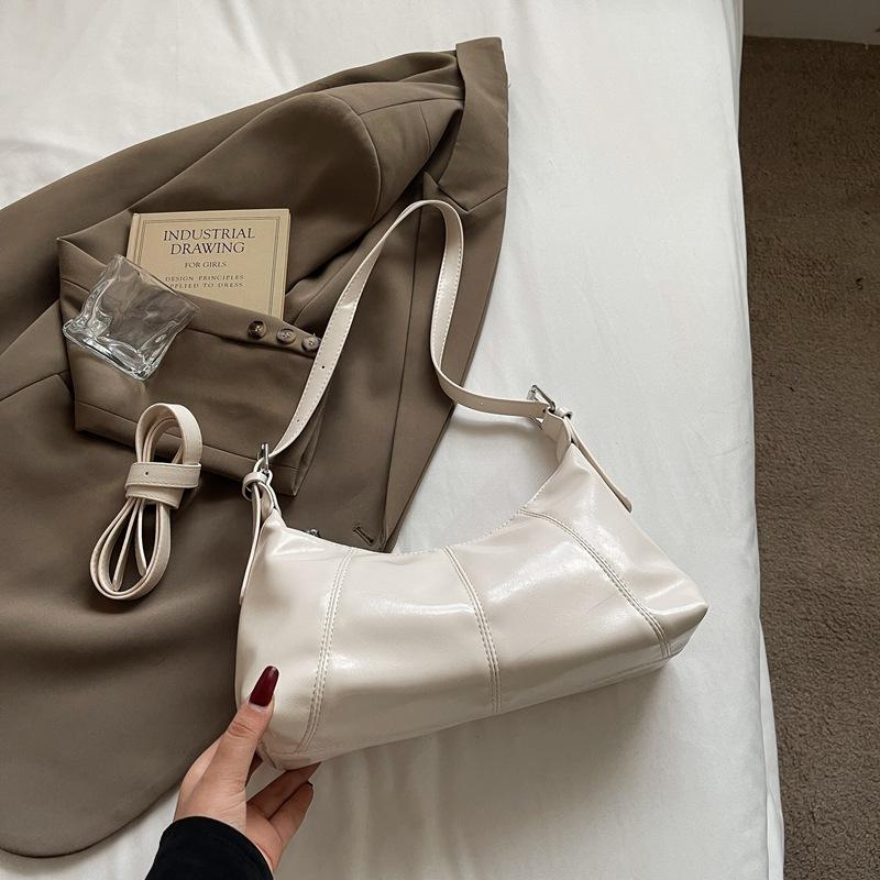 

Сумка большой вместимости женская летняя универсальная 2025 новая нишевая сумка-мессенджер на одно плечо под мышку сумка-пельмень