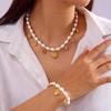 Beliebter Feiertagsstil Muschel Schneckenhaus Seestern Anhänger Imitationsperlen Perlenkette Armband Set