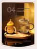 Constant Temperature Multifunctional Health Kettle: Automatic Office Tea Brewer & Glass Flower Teapot Gift.