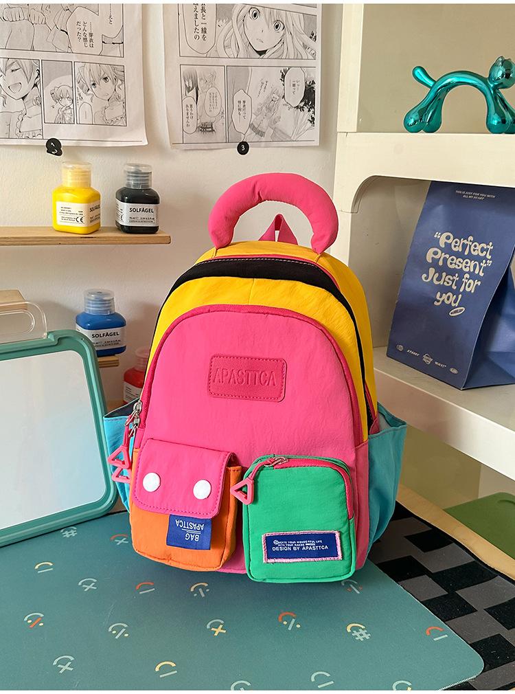 Schoolbag vitality rainbow color matching splicing backpack girl childlike dopamine wind shopping photo clock in backpack