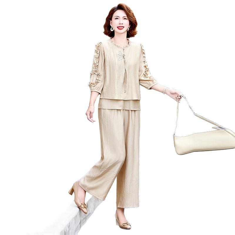 Elegante Set Estivo 2026 in Due Pezzi: Pantaloni larghi alla moda che contrastano l'età per donne di mezza età ed anziane