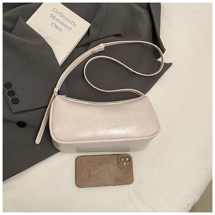 

South Korea s niche new fashion underarm bag 2025 spring leather simple and versatile commuter one-shoulder cross-body bag for women белый