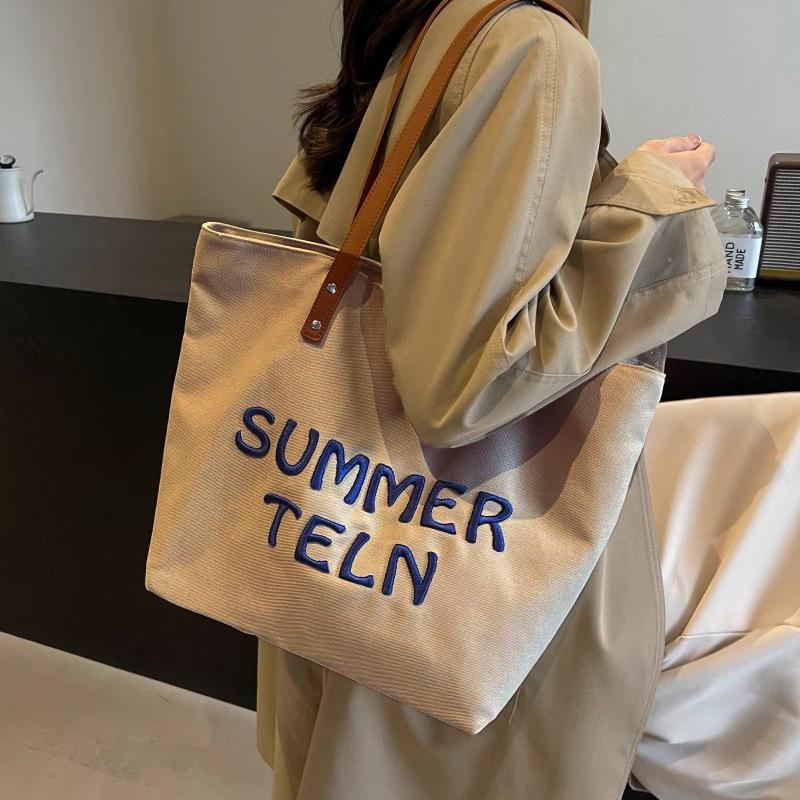 Bag Women's 2026 New Fashion Large Capacity Commuter Casual Versatile Single Shoulder College Student Class Tote Bag