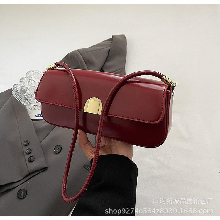 

2025 new baguette bag fashionable light luxury French niche texture foreign style retro handbag single shoulder underarm bag women червоний