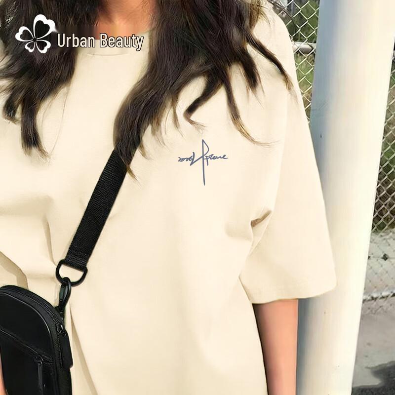 Tricou de damă din bumbac pur, cu croială largă, mânecă scurtă și grafică cu vârf de pix