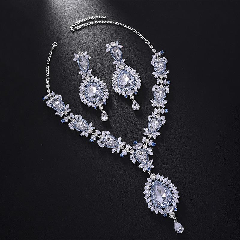 

Богемный Фэн-шуй Набор капельных украшений Преувеличенная цепочка на ключицу со стразами Персонализированные серьги Женский набор украшений silver plated