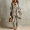 Completo estivo casual da donna a due pezzi: top a righe ampio con scollo a V e pantaloni a gamba larga