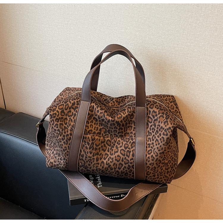 

Popular polished handheld big bag women s 2025 new retro large-capacity Boston bag Korean version shoulder messenger bag