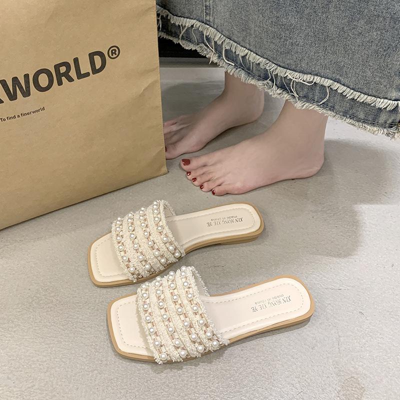 

Large size beads one-word flat slippers women s summer wear 2025 new open-toed pearl sandals fairy wind beach 35 бежевый