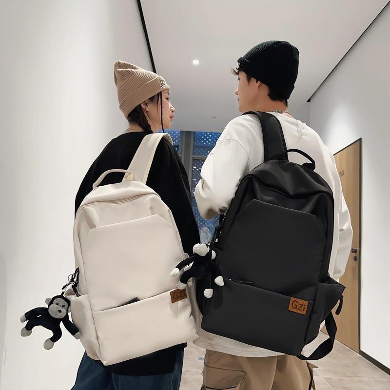 A Super Cool  Simple and Large capacity Backpack for Male College Students and A Travel Backpack for Female Junior and Senior High School Students