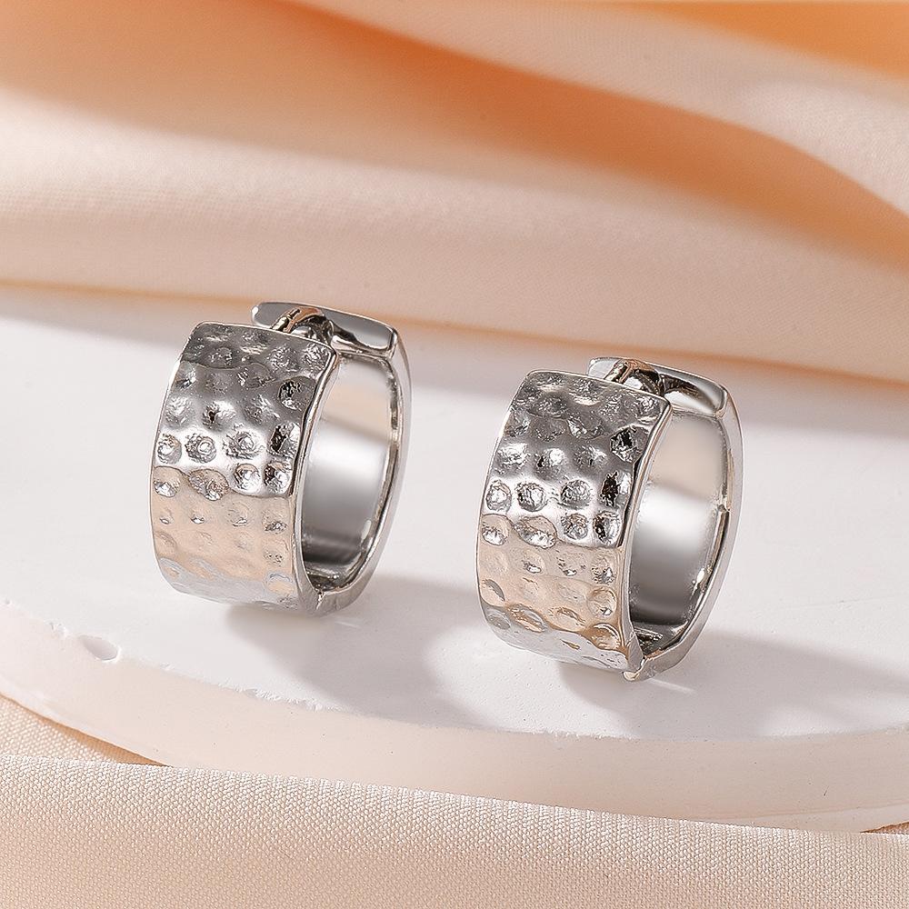 French pleated earrings with irregular texture and wide retro earrings