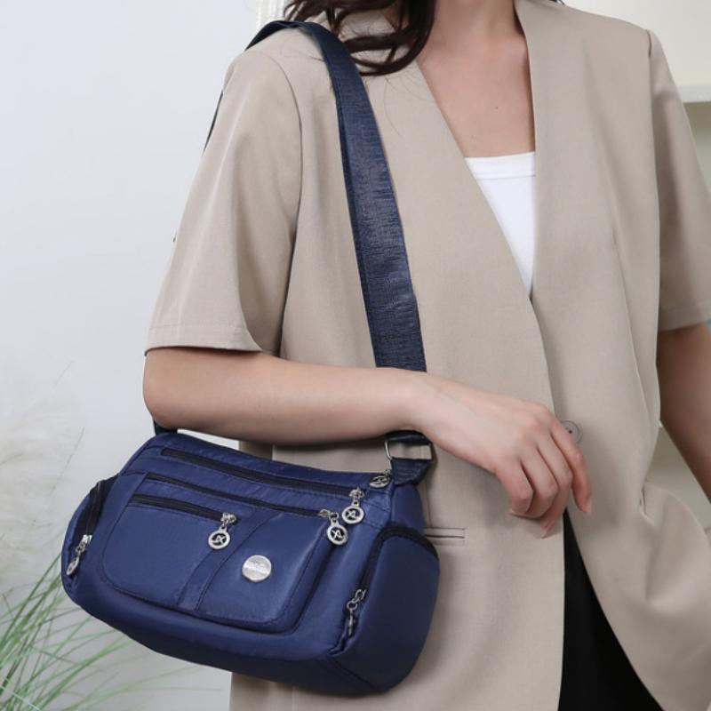Bag Women's Large Capacity Shoulder Bag Waterproof and Wear Resistant Multi Pocket Commuter Leisure Outdoor Crossbody Bag