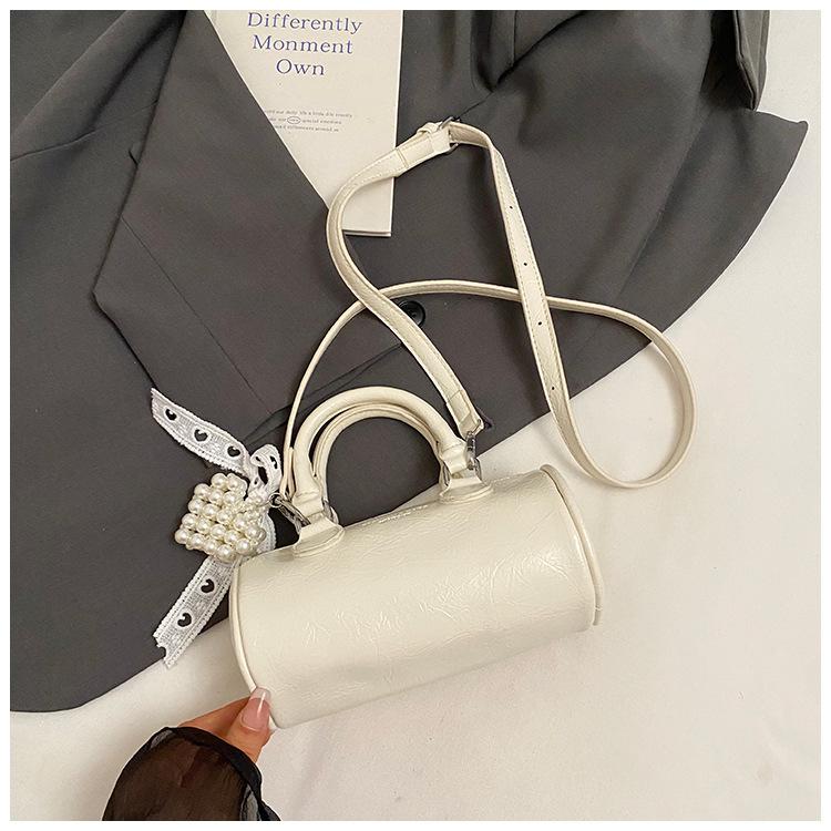 

Лето 2025 новая высококлассная маленькая сумка в иностранном стиле женская универсальная сумка через плечо модная персонализированная портативная сумка-бостон