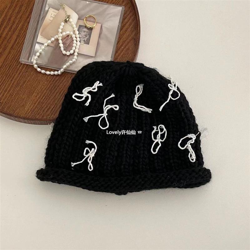 Autumn and winter crimped bow knitted bag head fashionable cold hat women's trendy new wool hat warm and sweet