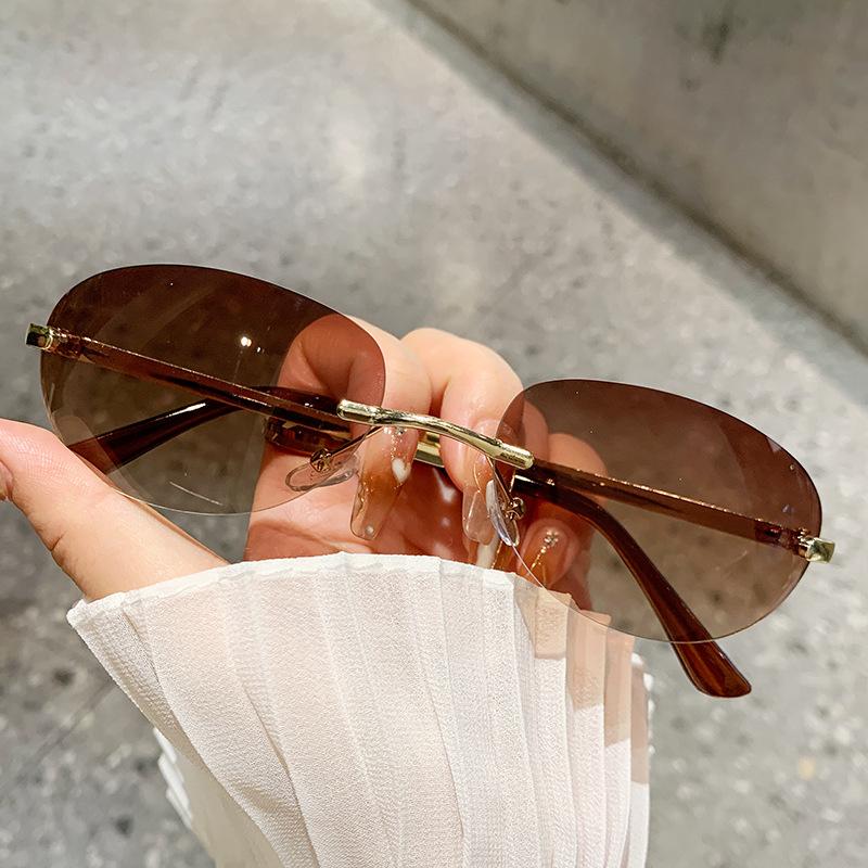 Unisex Rimless Sun Glasses Trendy Minimalist Cut Out Design Vintage Inspired Metal Frame Fashion Eyewear for Women Sunglasses