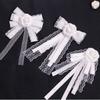 Elegant White Silk Bow Brooch For Women With Pearl Detailing For Formal Wear