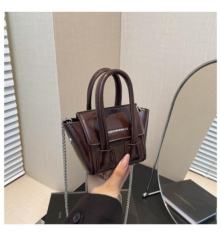 

Mini foreign niche bag sweet girl smiley face wing bag chain messenger bag single shoulder women s bag mouth red envelope