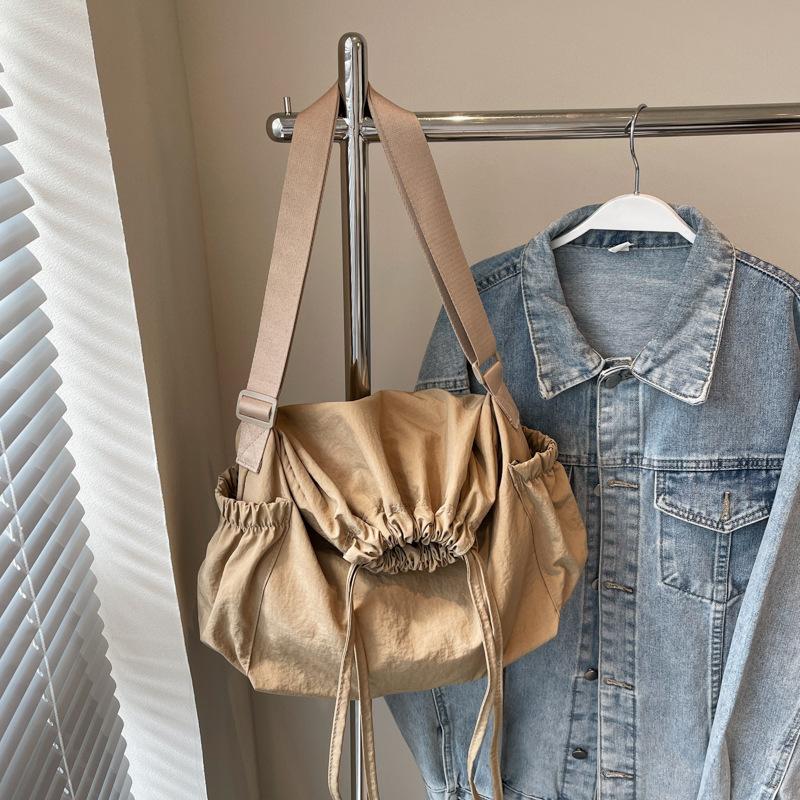 

Couple drawstring oblique span bag large capacity folding messenger bag unisex stray bag solid color casual shoulder bag хаки