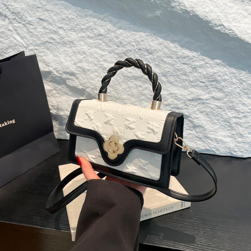 This year's new casual twist handheld women's bag Korean version of temperament versatile shoulder messenger bag fashionable and atmospheric small squ