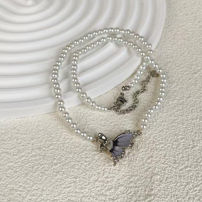 Sweet and cool wind irregular blue butterfly glazed necklace female personality niche trend versatile high sense collarbone chain jewelry