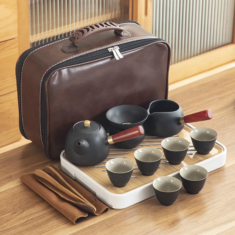 Black pottery Kung Fu tea set, cheap ceramic side handle pot with tea tray, portable complete set of business gifts