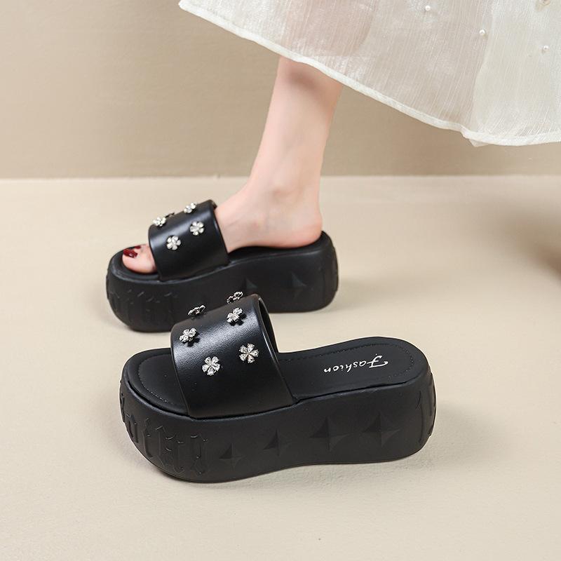 

New thick-soled slippers women wear muffin bottom to increase height and look thin beach sandals versatile one-word drag 40 чёрный