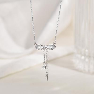 Collier à pampilles nœud papillon pour femmes au tempérament exquis, polyvalent et luxueux, chaîne clavicule haut de gamme, nouveau niche