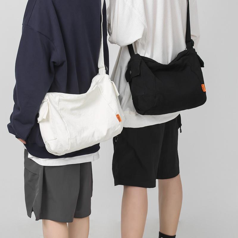 Schooltas schoudertas heren Japanse mode nieuwe eenvoudige canvas messenger bag ins schoudertas student rugzak messenger bag