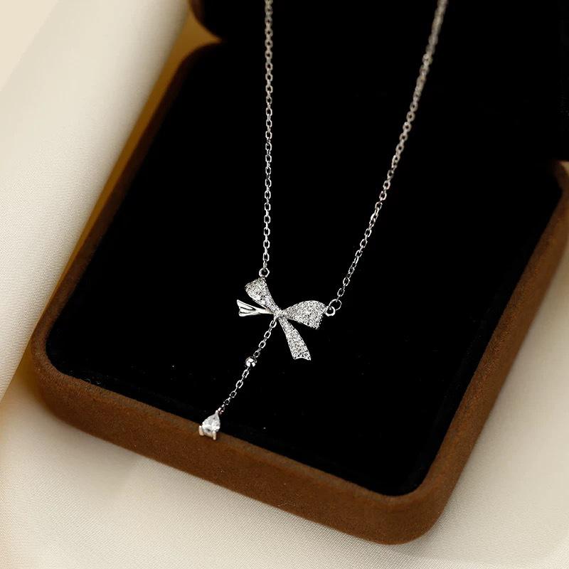 Zhongying Jewelry Ожерелье с бантом и кисточкой в форме капли Женская элегантная цепочка на ключицу