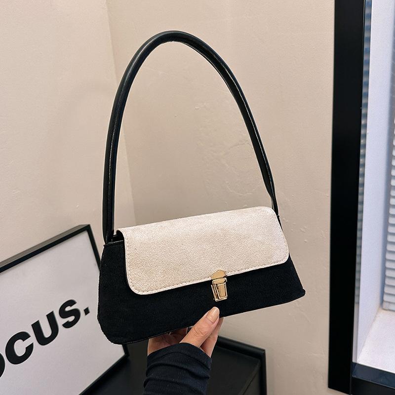 

Нишевый дизайн французская сумка-багет сумка подмышкой 2024 зимняя новая сумка сращивания контрастного цвета женская сумка через плечо женская чёрный