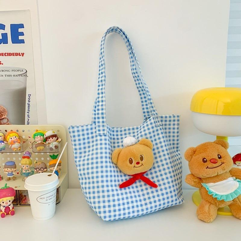 Cute bear backpack, new blue plaid shoulder tote bag, large-capacity casual commuter canvas backpack.
