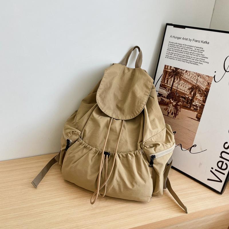 School bag with lazy style pleated drawstring niche design backpack for women, 1011 new casual lightweight backpack, small backpack