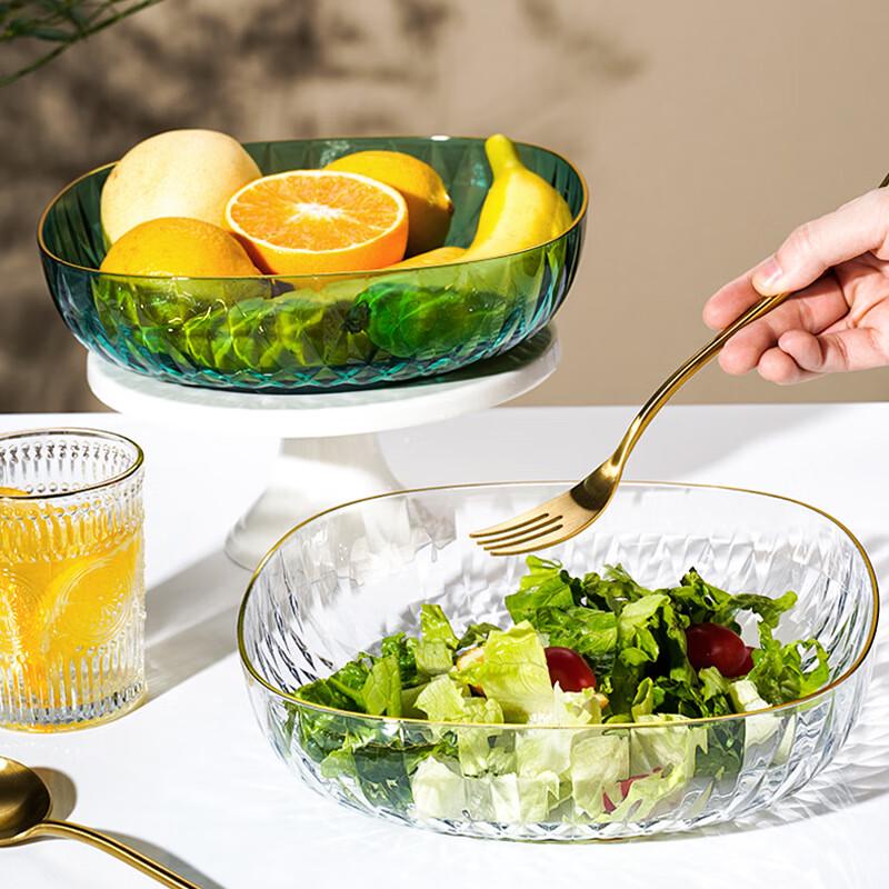 Набор прозрачных пластиковых неровных фруктовых тарелок и мисок для закусок