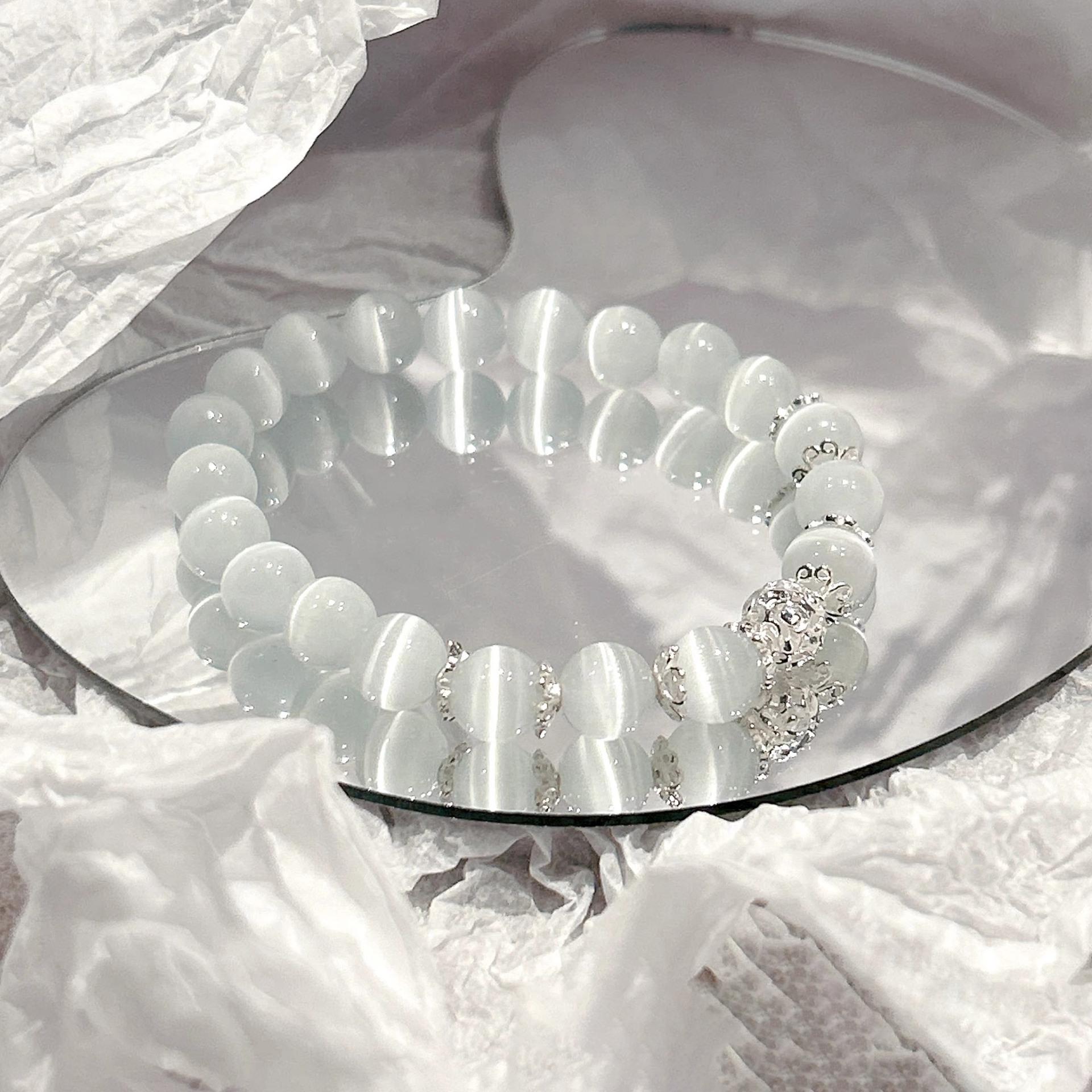 

Женский браслет из белого опала