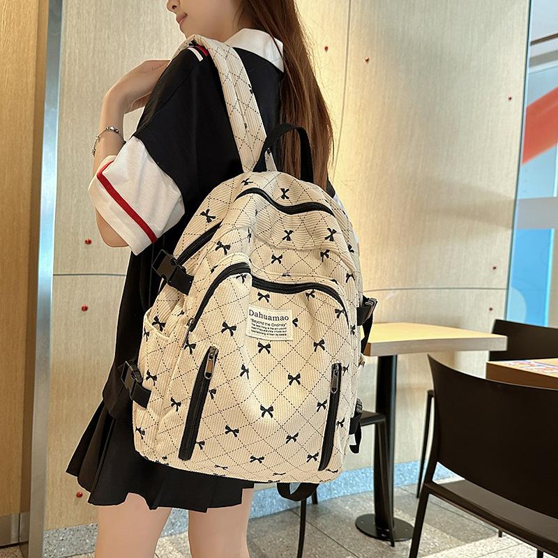 Schoolbag trendy schoolbag women's new corduroy large capacity bow printing student backpack high value backpack