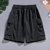 Men Shorts Adjustable Drawstring Elastic Waist Sports Shorts with Multi Pockets Solid Color Loose Fit Casual Shorts