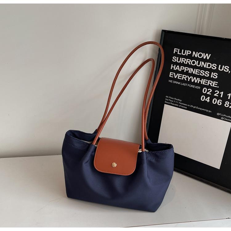 

Premium commuter large-capacity bag women s 2025 new casual versatile shoulder bag fashionable portable tote bag синий