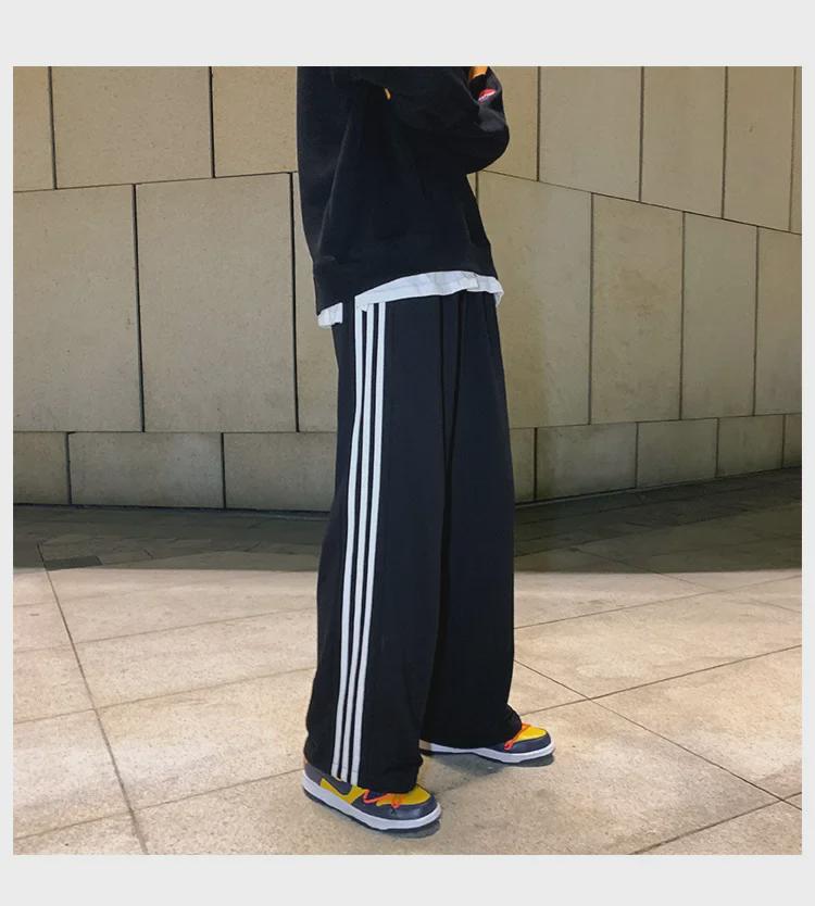 Damskie spodnie sportowe w paski w stylu koreańskim - luźne, sięgające do ziemi, w jednolitym kolorze, na wiosnę i jesień