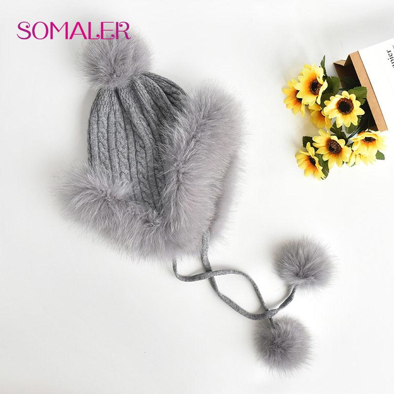 SOMALER Winter Knit Real Fur Hats for Women Real Fox Fur Earflap Cap with Fur Pom Pom Warm Knitted Ear Protection Beanies